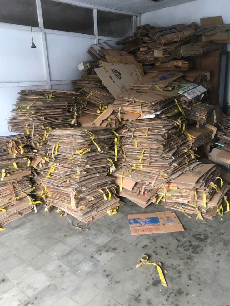 Baled scrap material collected and stacked ready for removal