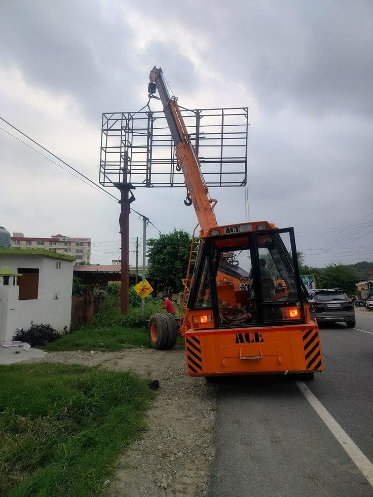 Crane lifting a steel structure into position